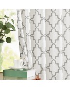White and grey plaid print light filtering curtains